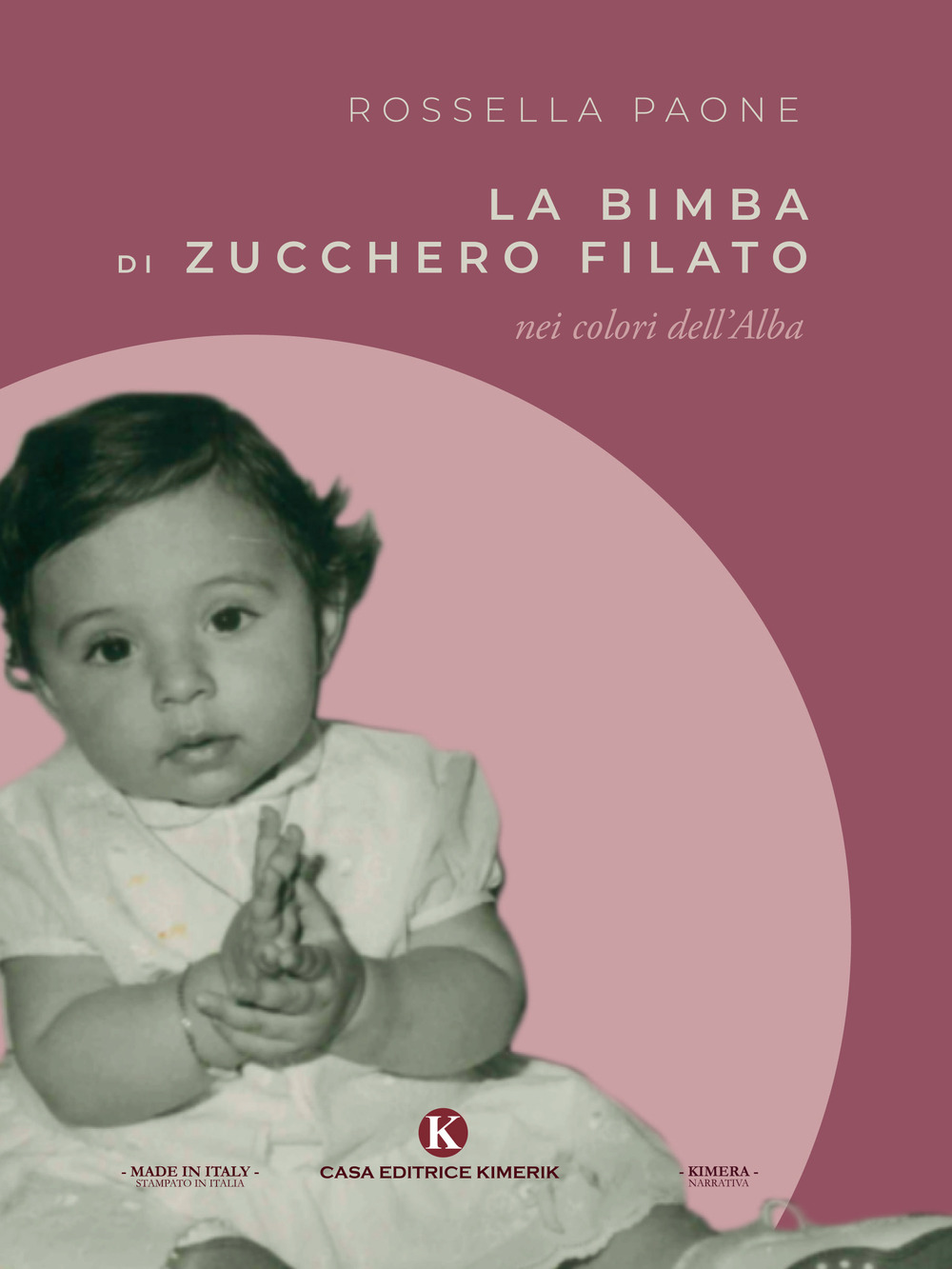 La bimba di zucchero filato nei colori dell'Alba